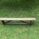 Old solid wood farm bench
