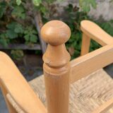 Old wooden and straw high chair for children