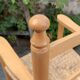 Old wooden and straw high chair for children