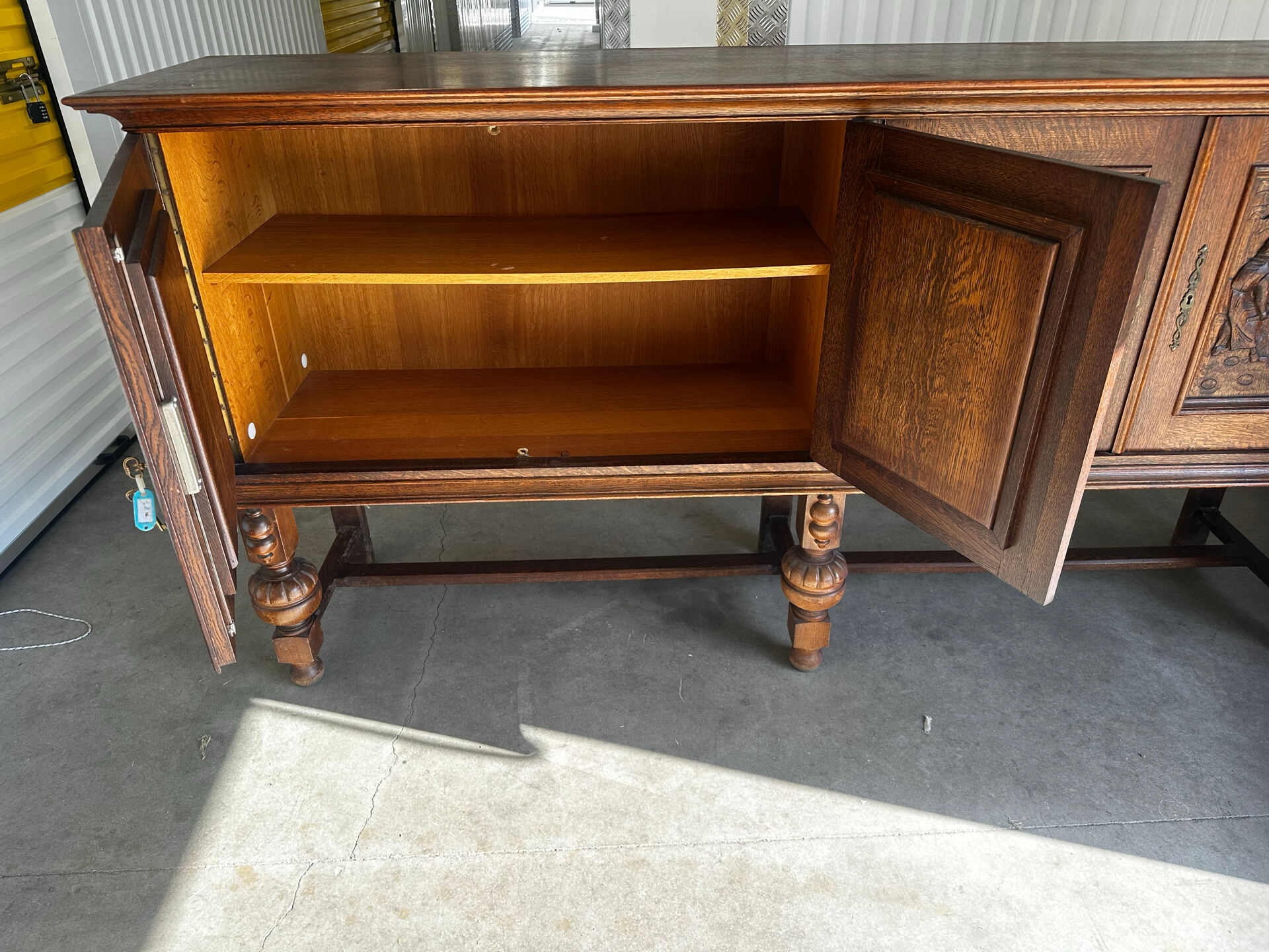 Large carved oak buffet in neo-Renaissance style, mid-20th century.