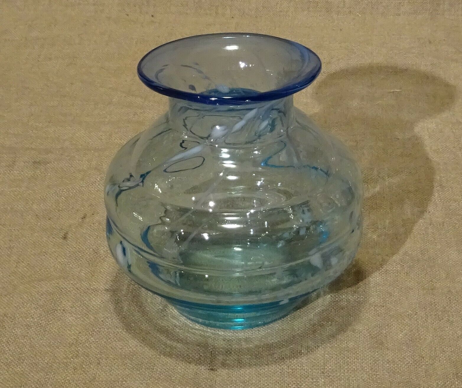 White speckled blue glass vase