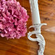 Louis XVI style bronze wall light with white patina