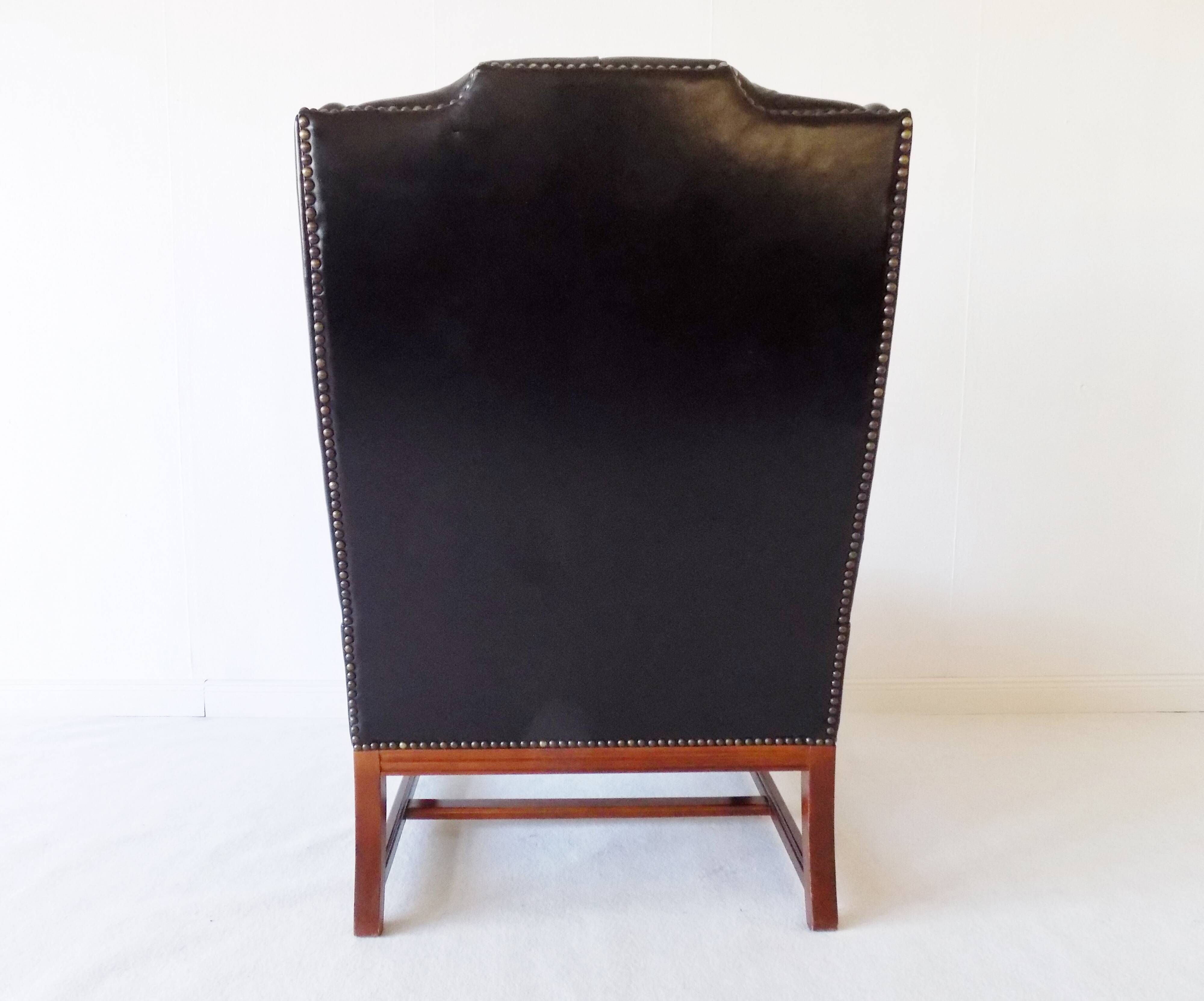 Chesterfield high back leather armchair black from the 1960s