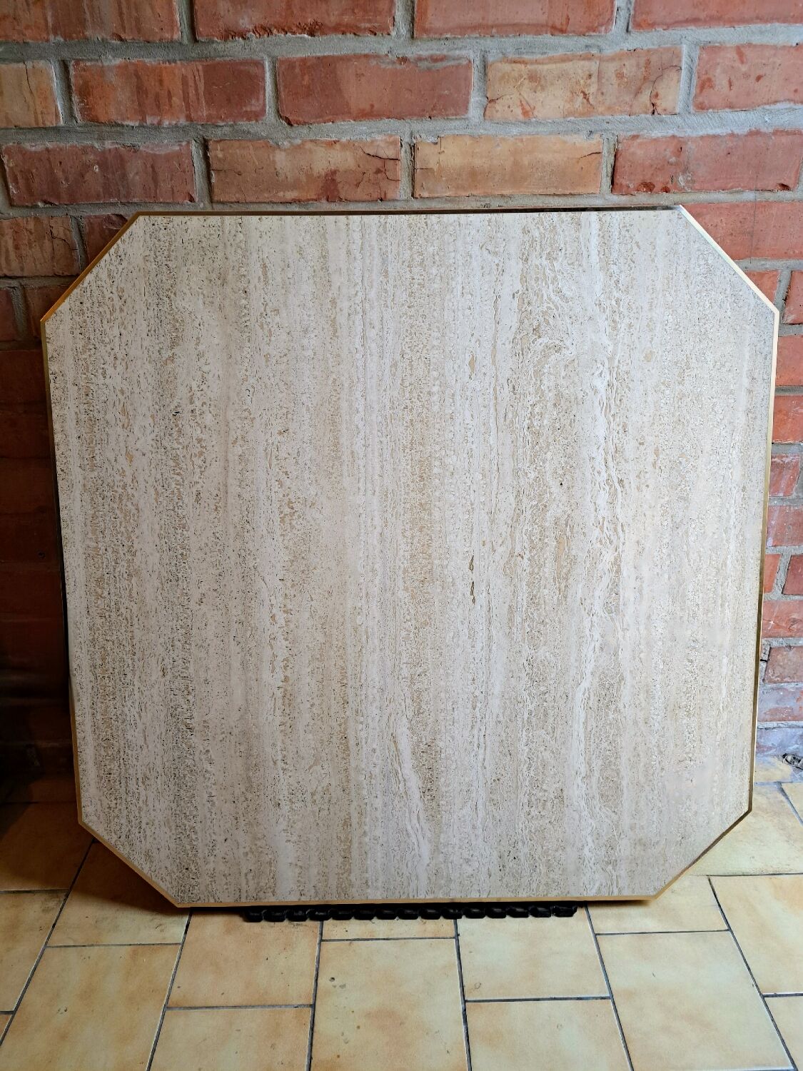 Travertine and brass coffee table