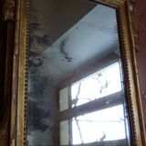 Louis XVI mirror (eighteenth century) in gilded stucco wood H 80 cm