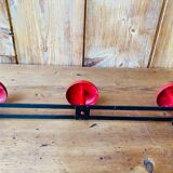 Wall coat rack in vintage red metal.