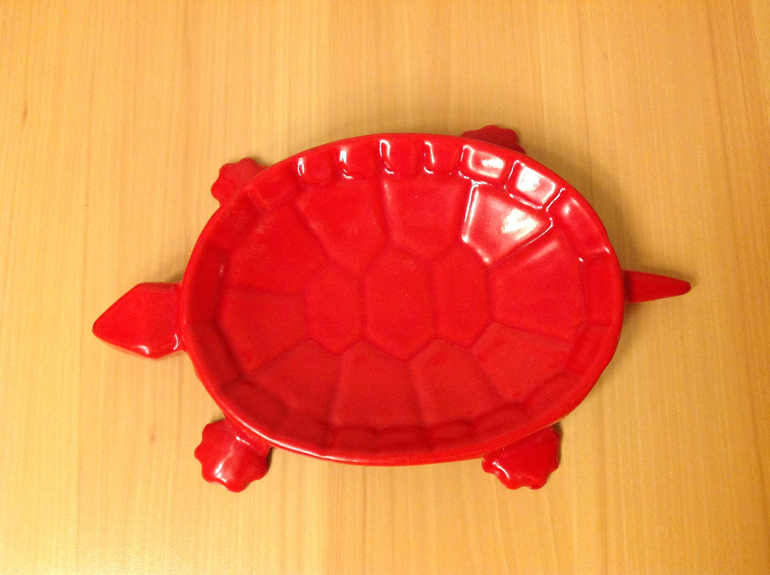 Turtle pocket emptier in enameled red cast iron by Castirone France