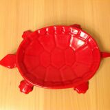 Turtle pocket emptier in enameled red cast iron by Castirone France