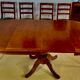 Round or oval table with four chairs in solid cherry, with extensions