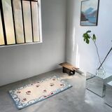 White and blue floral wool rug