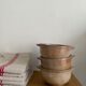 Three bowls in ancient sandstone