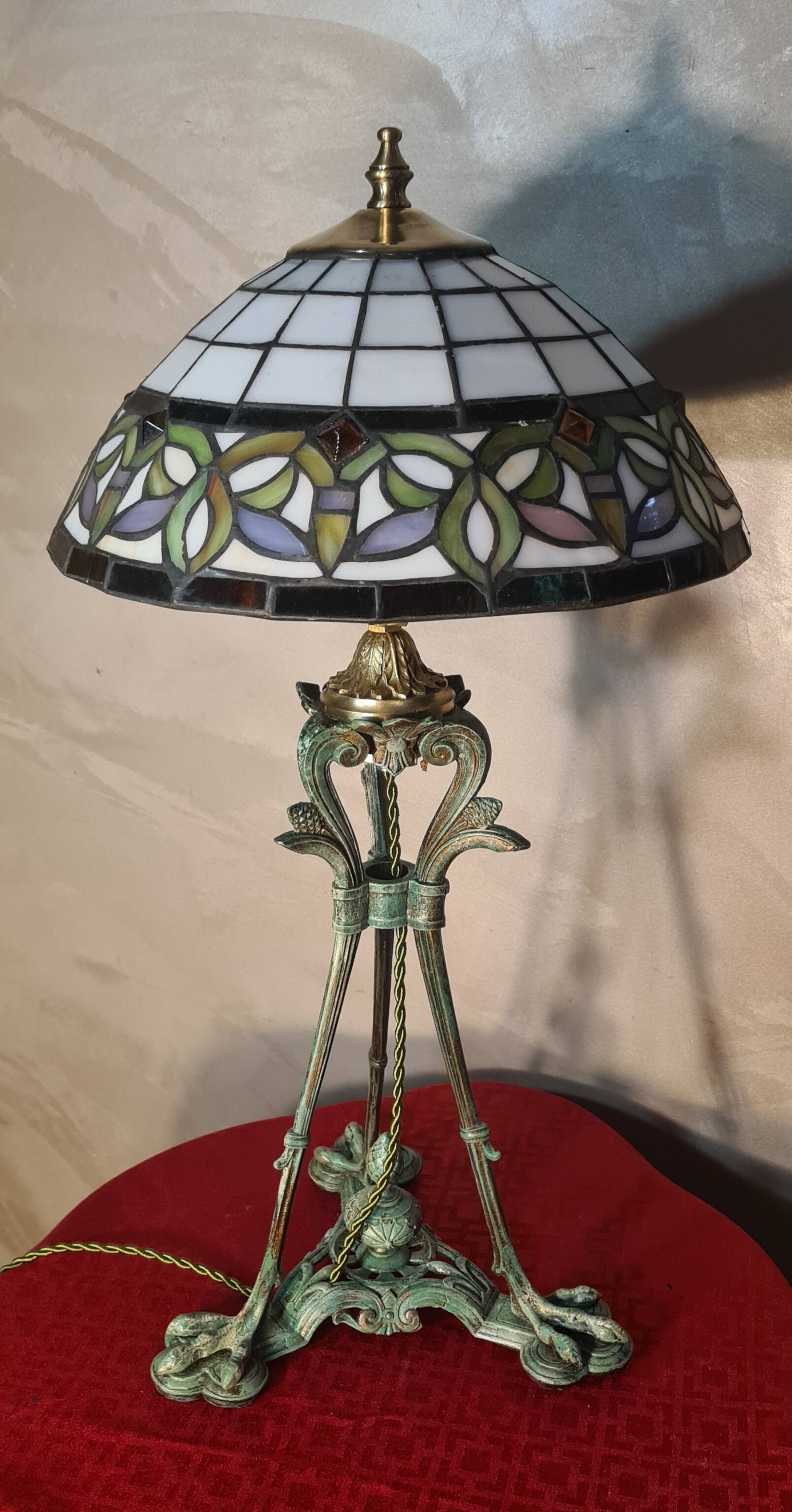 Antique patinated bronze regulator lamp with Tiffany glass shade in very good condition