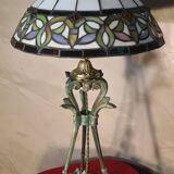 Antique patinated bronze regulator lamp with Tiffany glass shade in very good condition