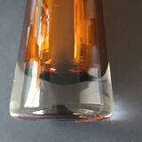 Two vintage Scandinavian double-layered amber blown glass candlesticks