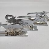 Set of four art deco knife holders after Benjamin Rabier, 1930