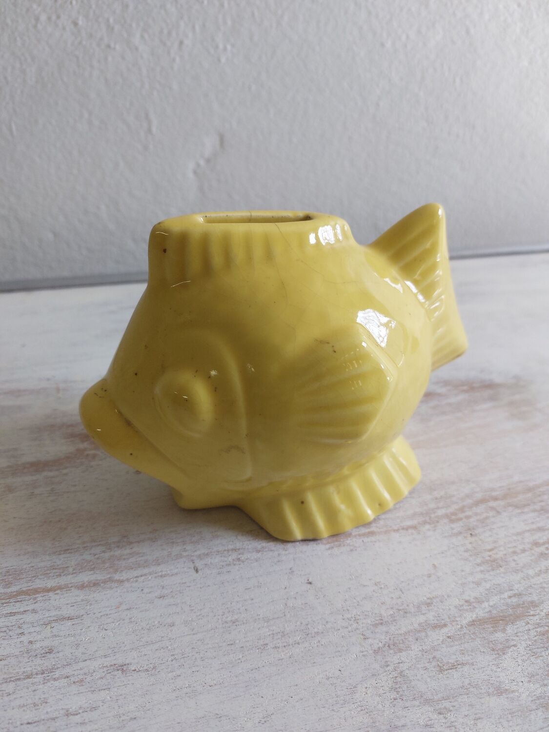 Ceramic piggy bank in the shape of a fish