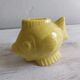Ceramic piggy bank in the shape of a fish