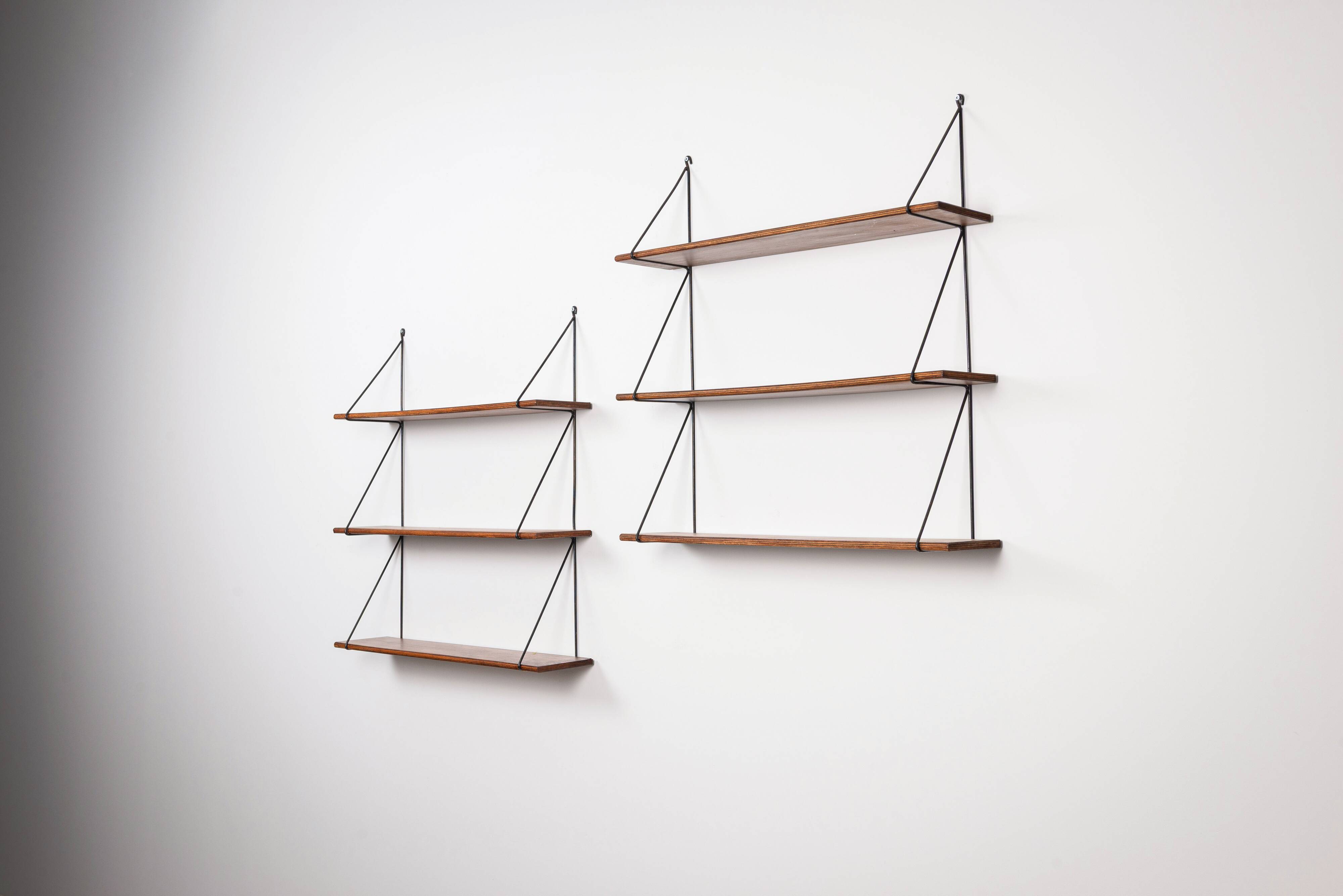 Set of minimalistic wooden shelving units