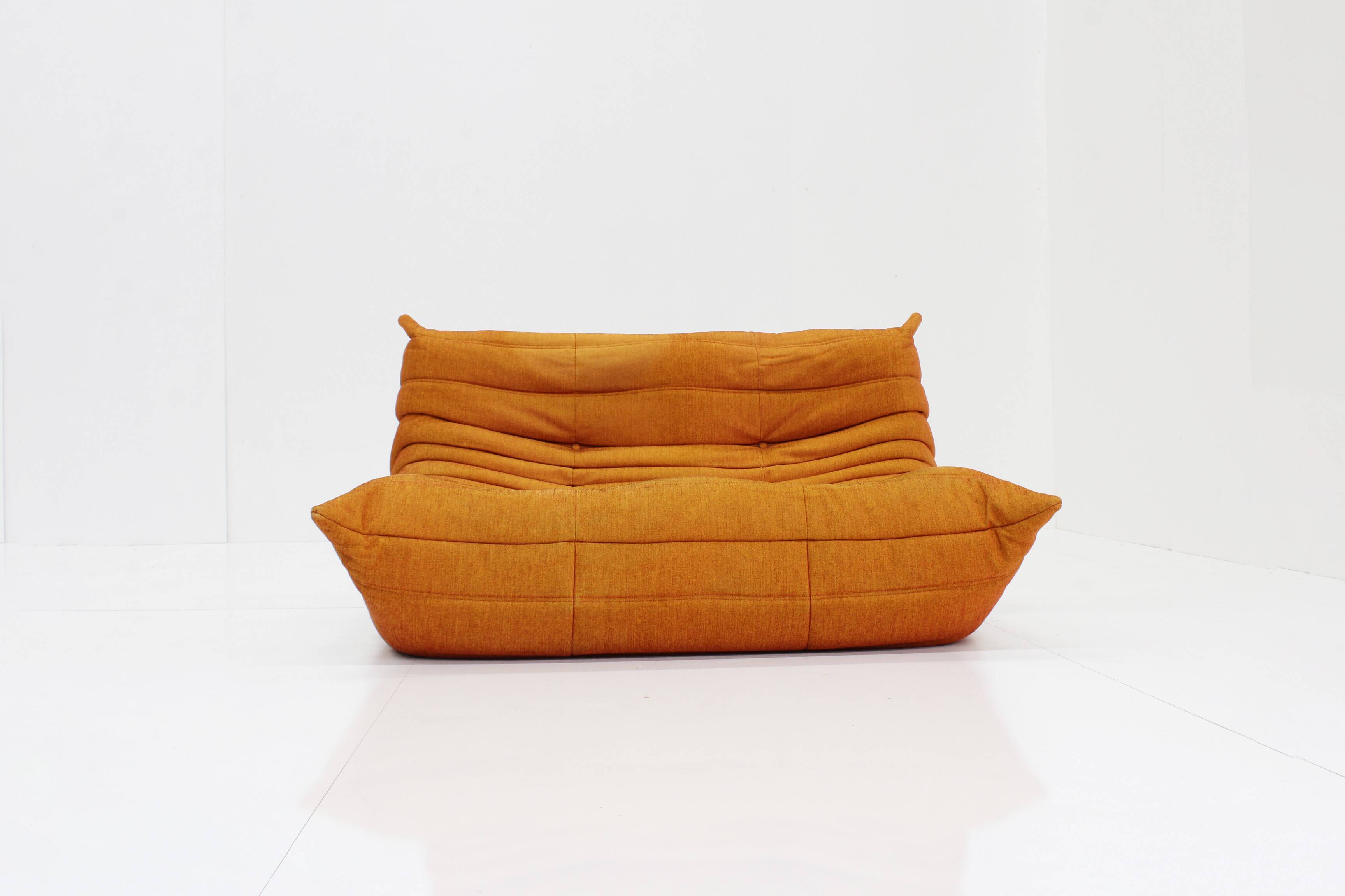 Ligne Roset Togo 2 seater sofa orange by Michel Ducaroy