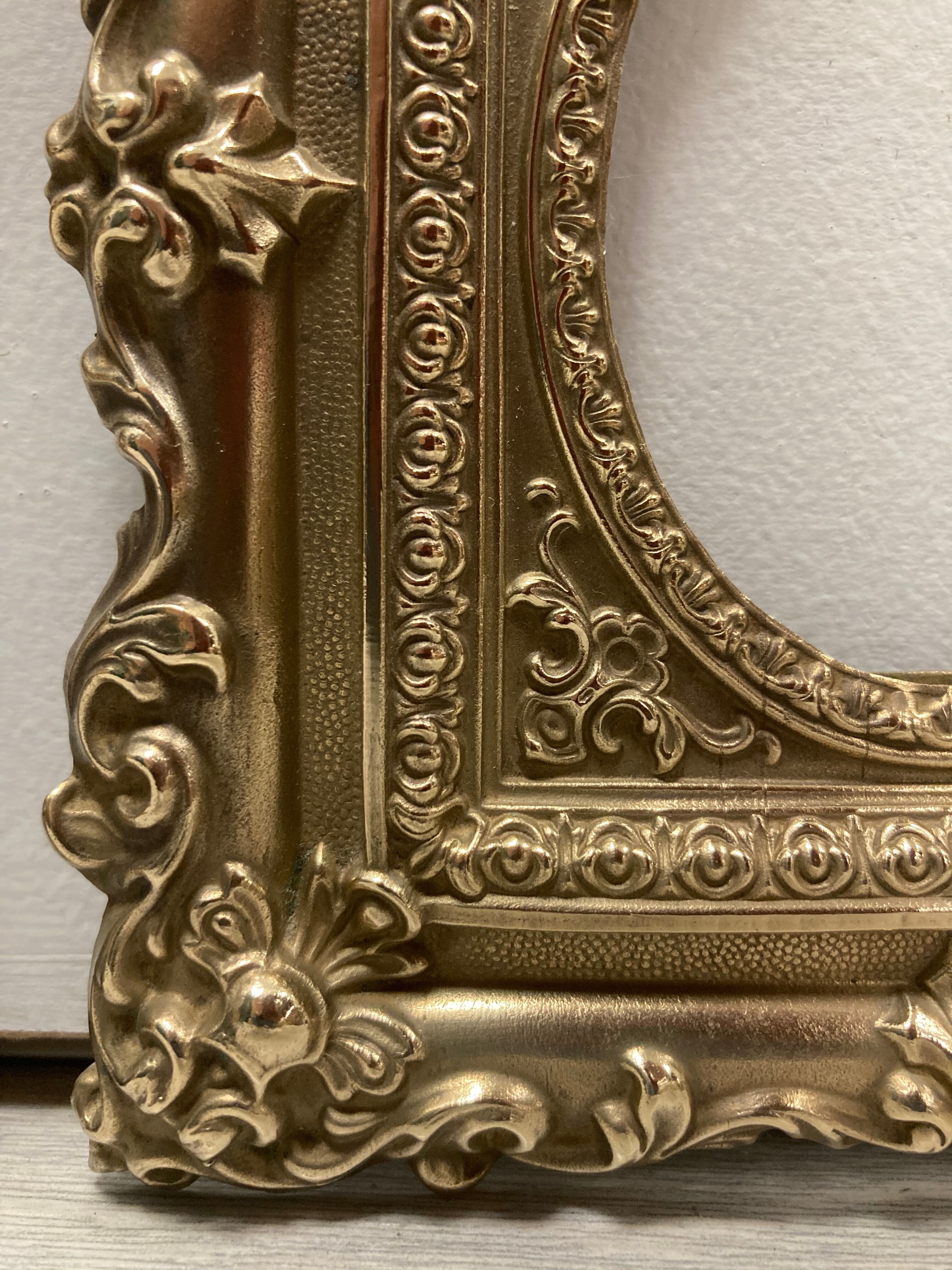 Pair of brass photo frames