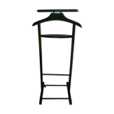 Vintage children's room valet in green varnished wood on roulette