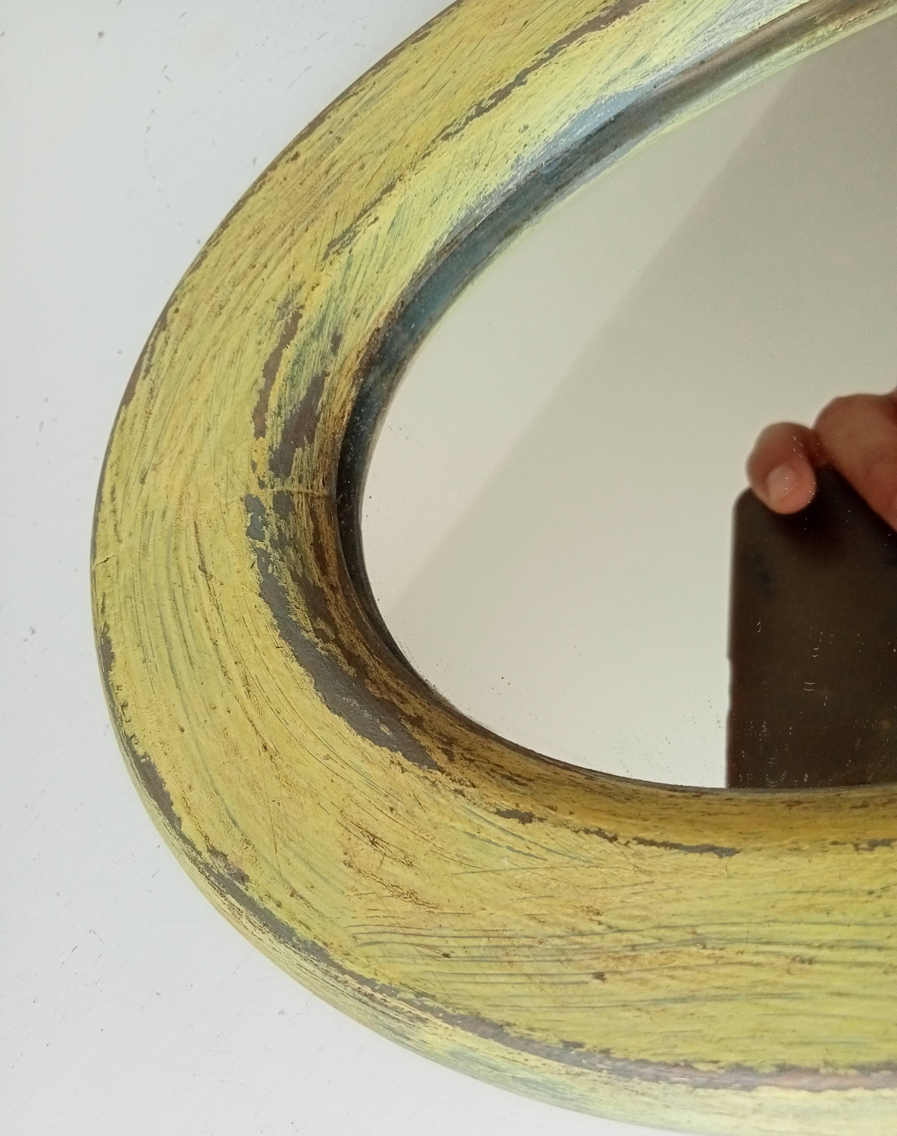 Small antique oval mirror