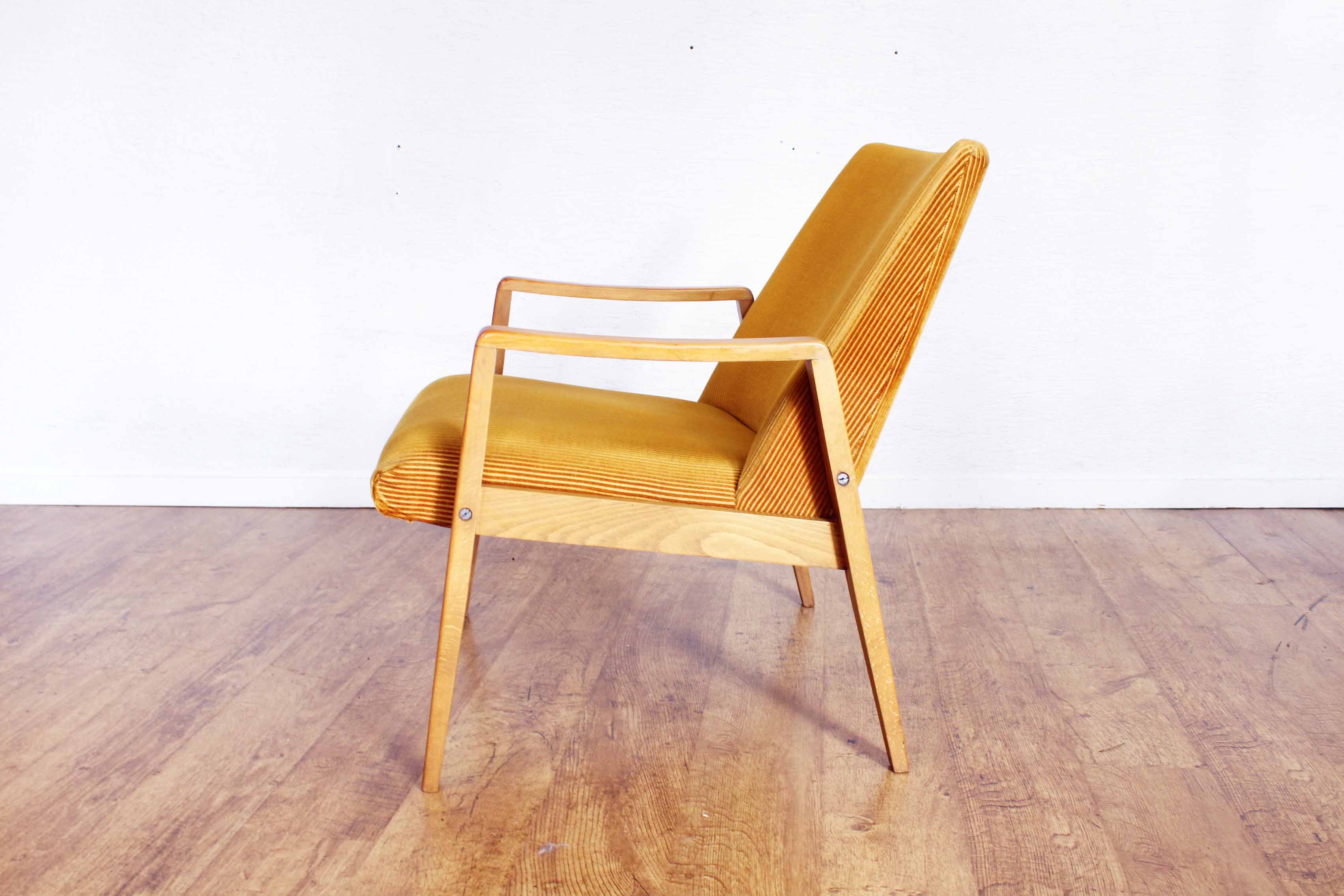 Scandinavian-designed chair in solid beech and mustard velvet