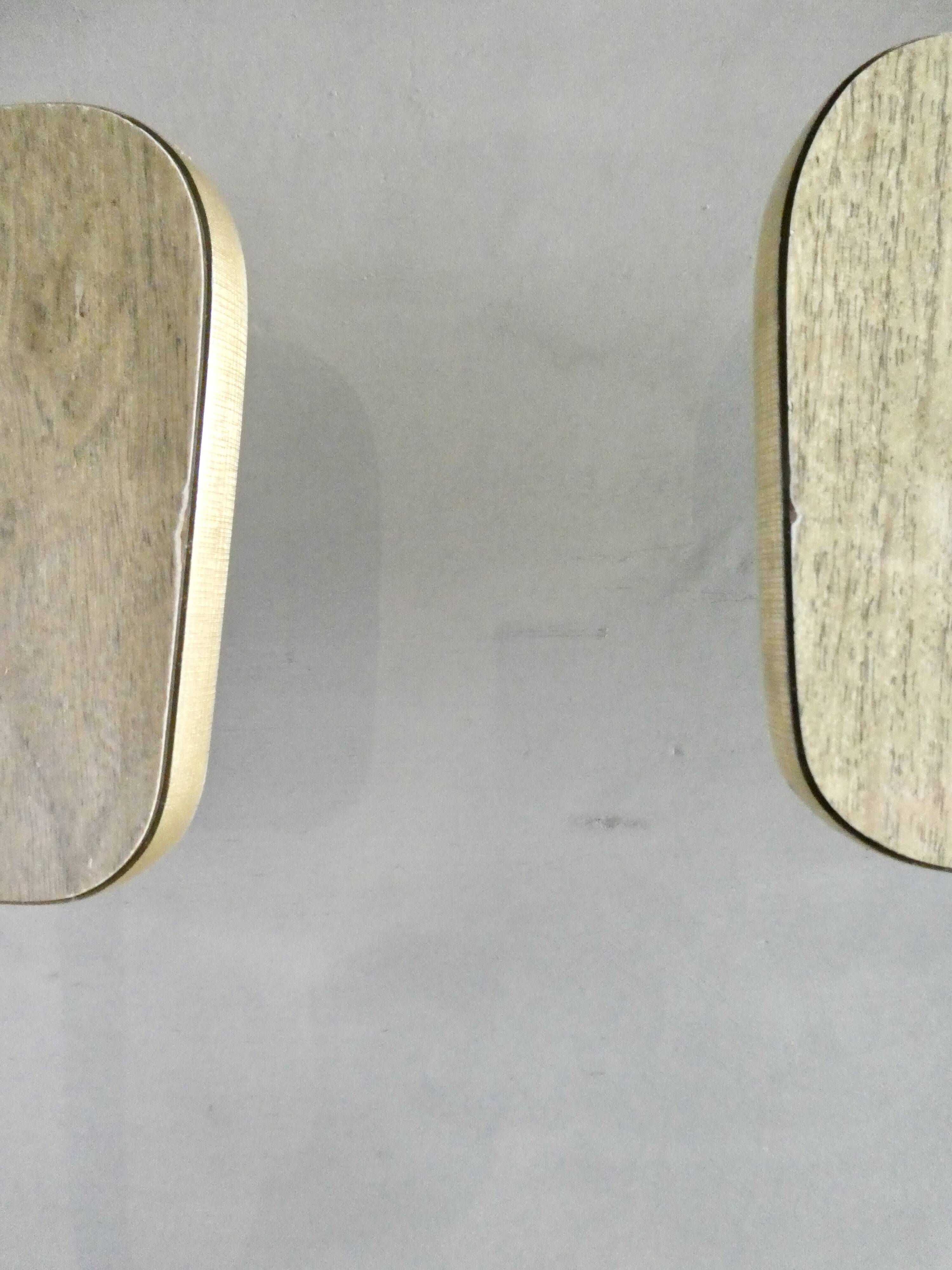 Pair of chairs in "wood" formica and gold edges, 1960s