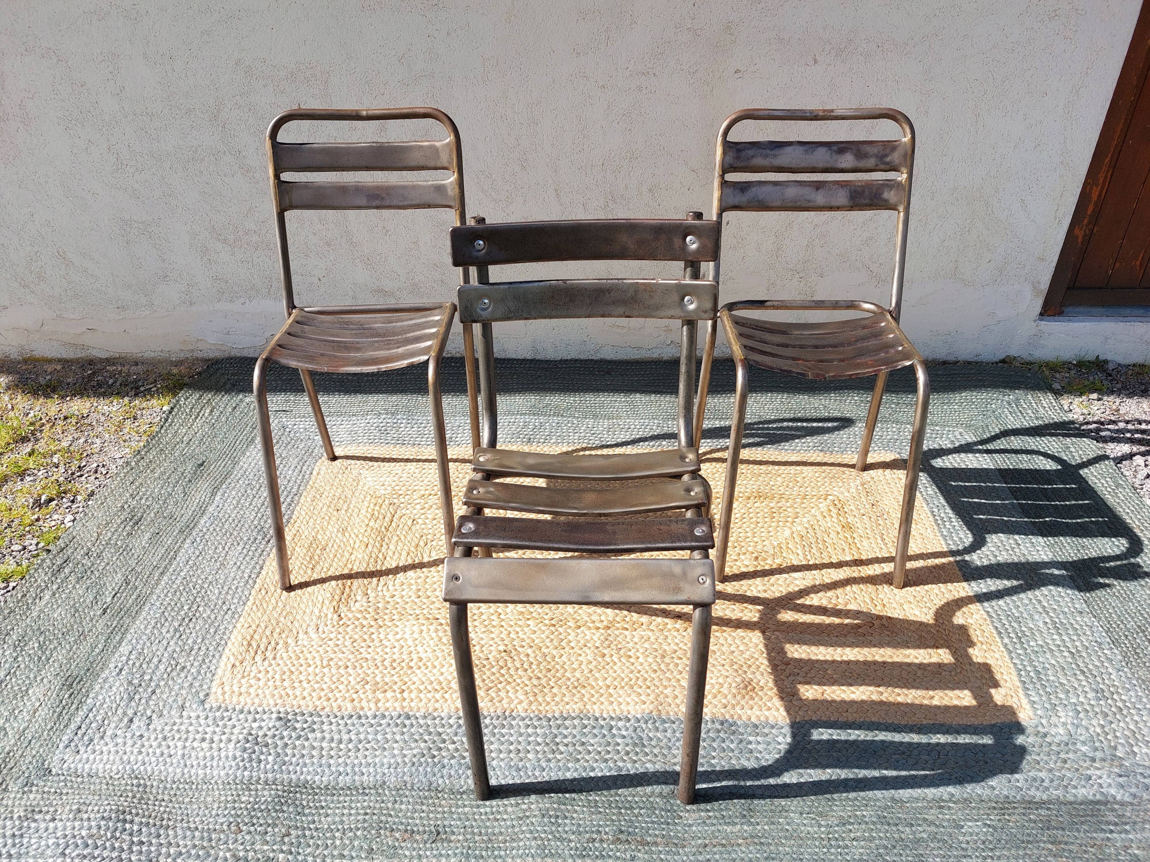 3 metal chairs, Tolix style