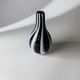 Vintage Murano glass vase from the 1980s, black and white swirl pattern, thick Italian art glass.