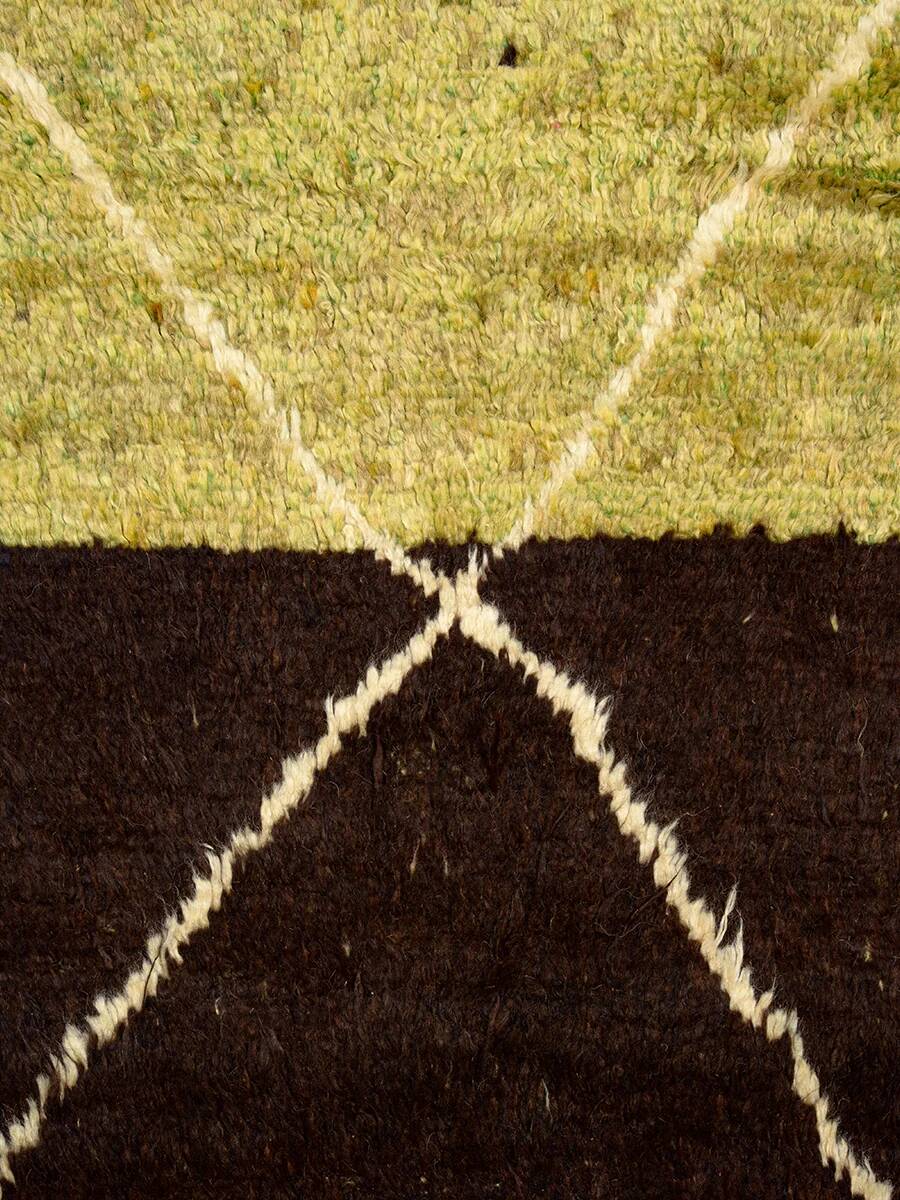 Hand-knotted low pile rug in vibrant earth tones by Anzal | 152 x 264 cm