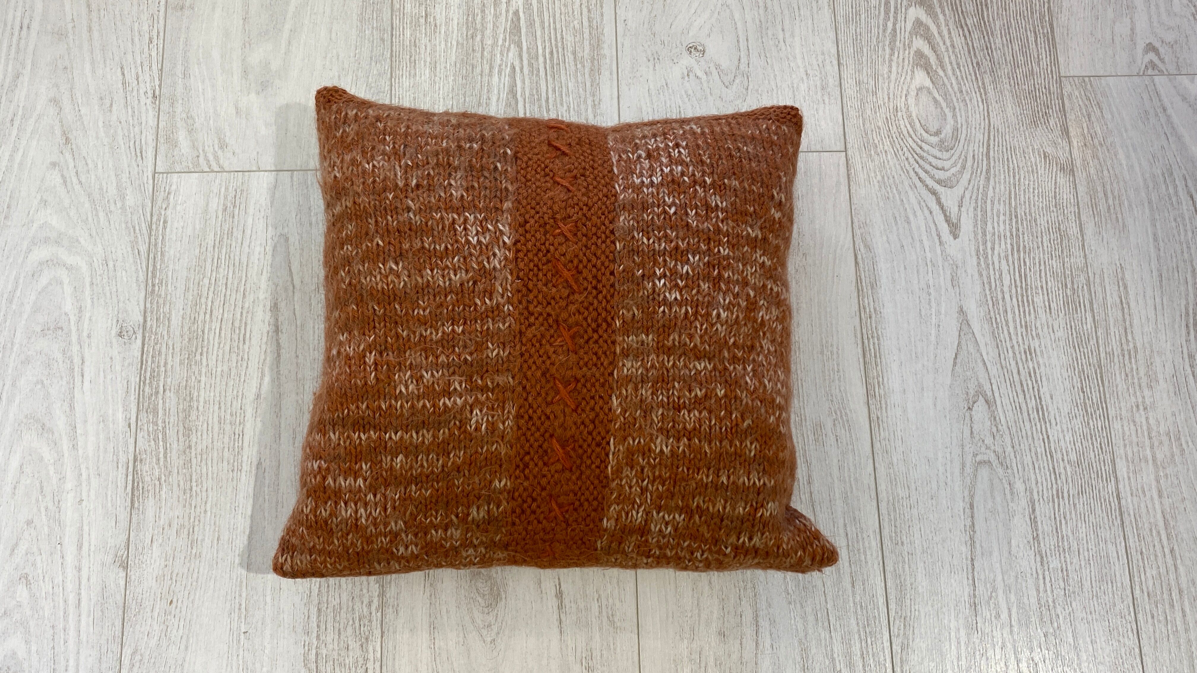 Pair of retro terracotta wool knit cushions