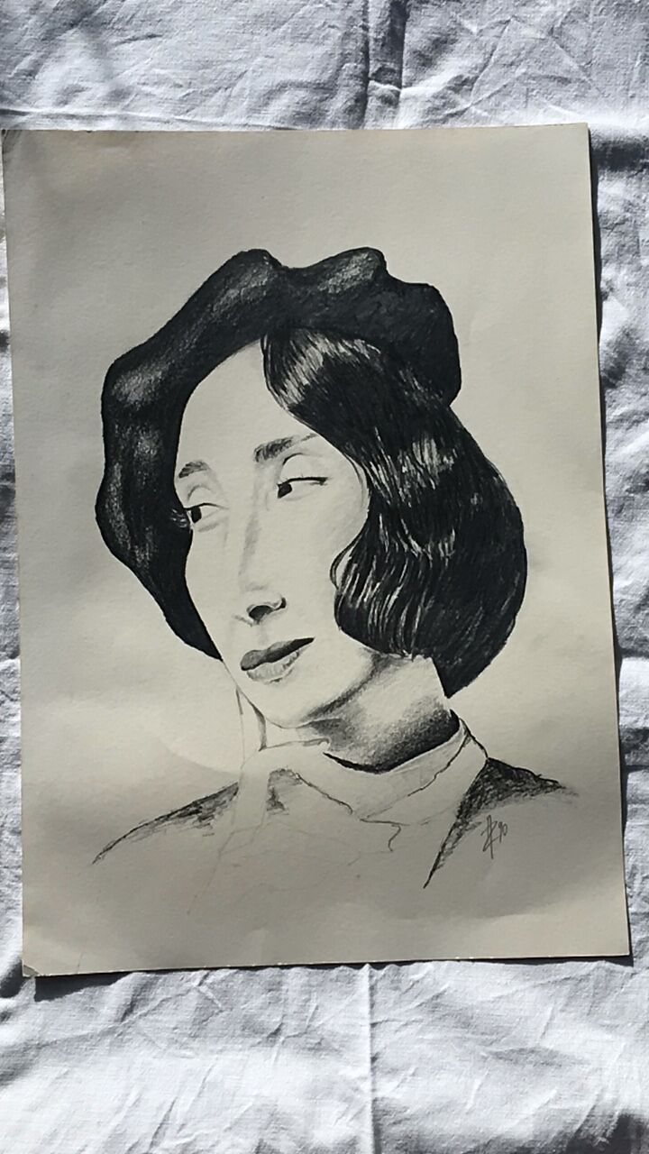 Portrait of a young woman in a beret