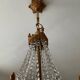 Lustre cascade en bronze et pampilles de cristal