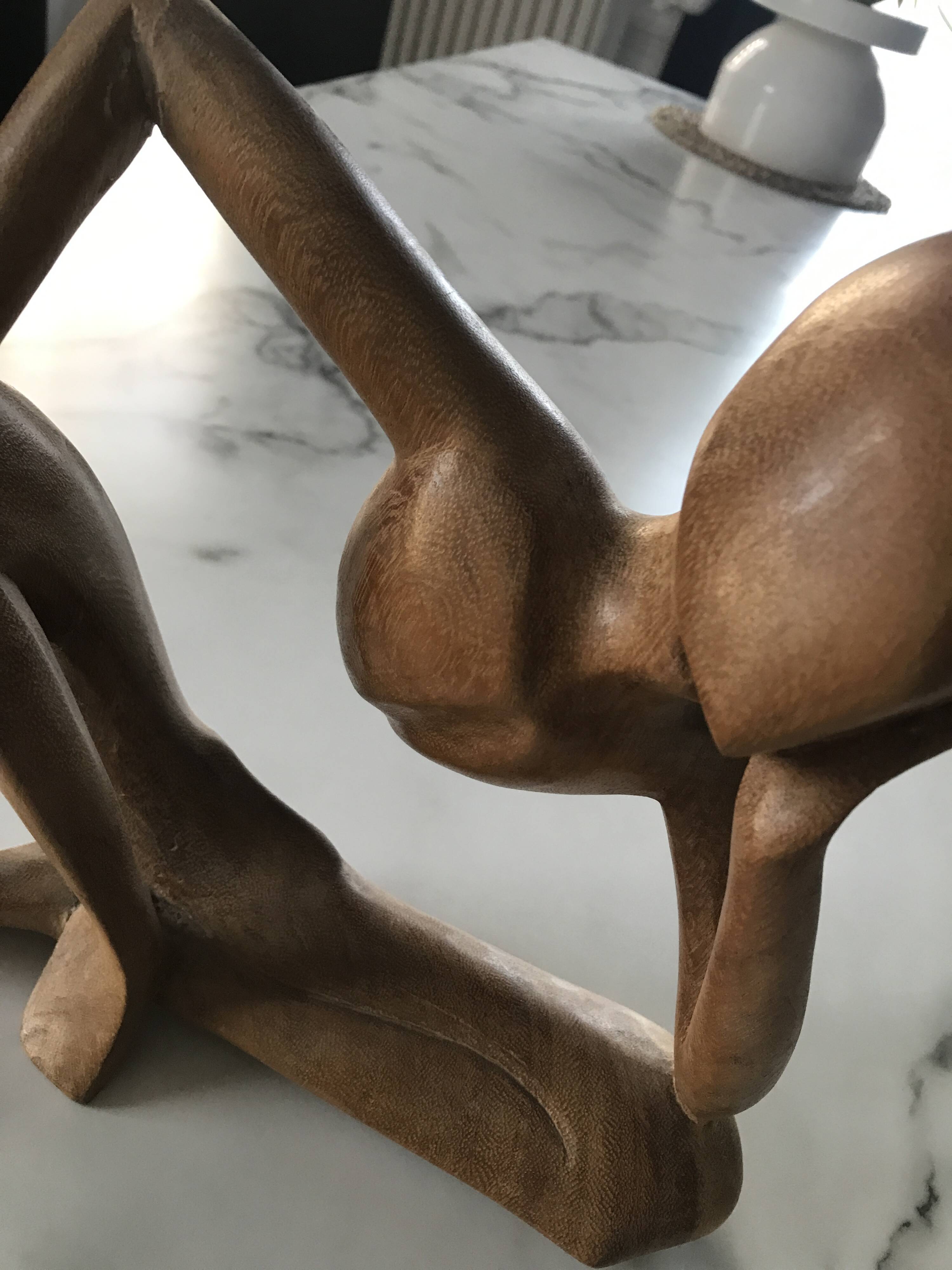 Pensive man wooden statue