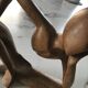 Pensive man wooden statue