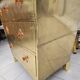 Handcrafted commode fully dressed in brass, original piece and