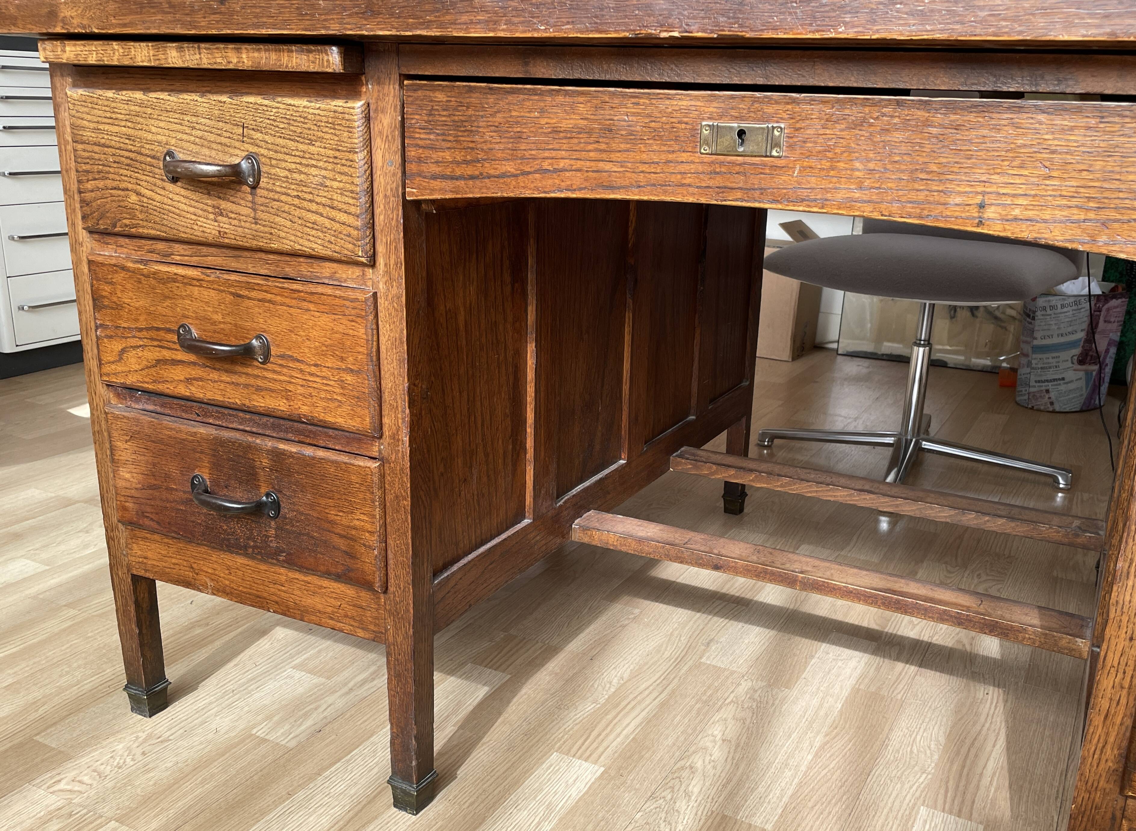Minister's desk in solid oak with marquetry 1930s