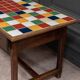 19th century oak farm table with multi-colored ceramic tiles