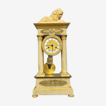 Empire period clock in gilded bronze and siena marble nineteenth century