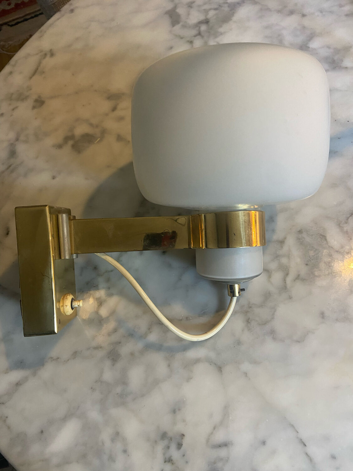 Vintage opaline and brass wall lamp