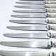 MARTIAL GAUTHIER / GEORGES FLAKENBERG - 12 KNIVES WITH SILVER HANDLES