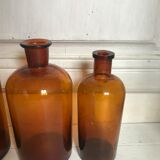 Trio of apothecary bottles