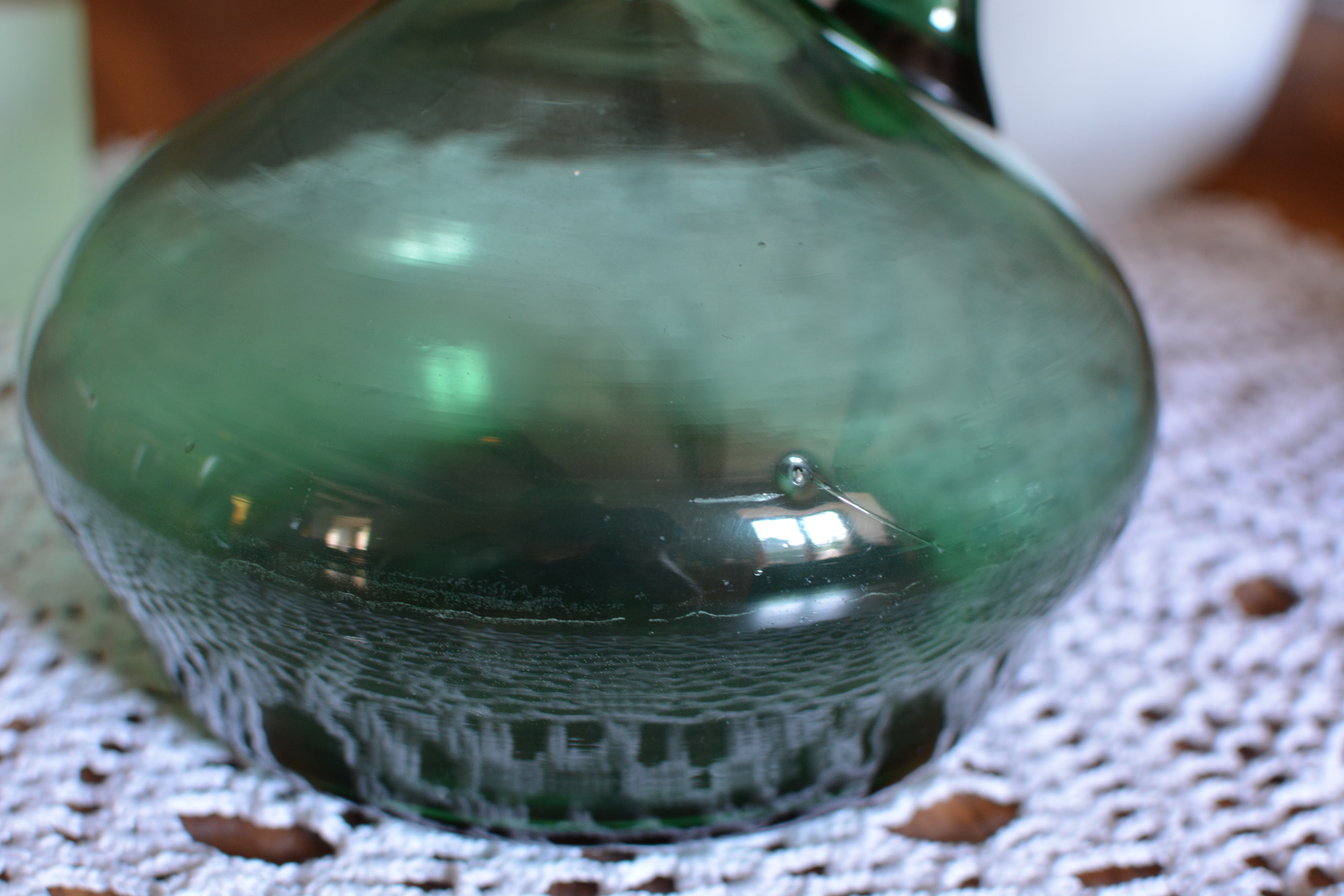 Blue green blown glass carafe