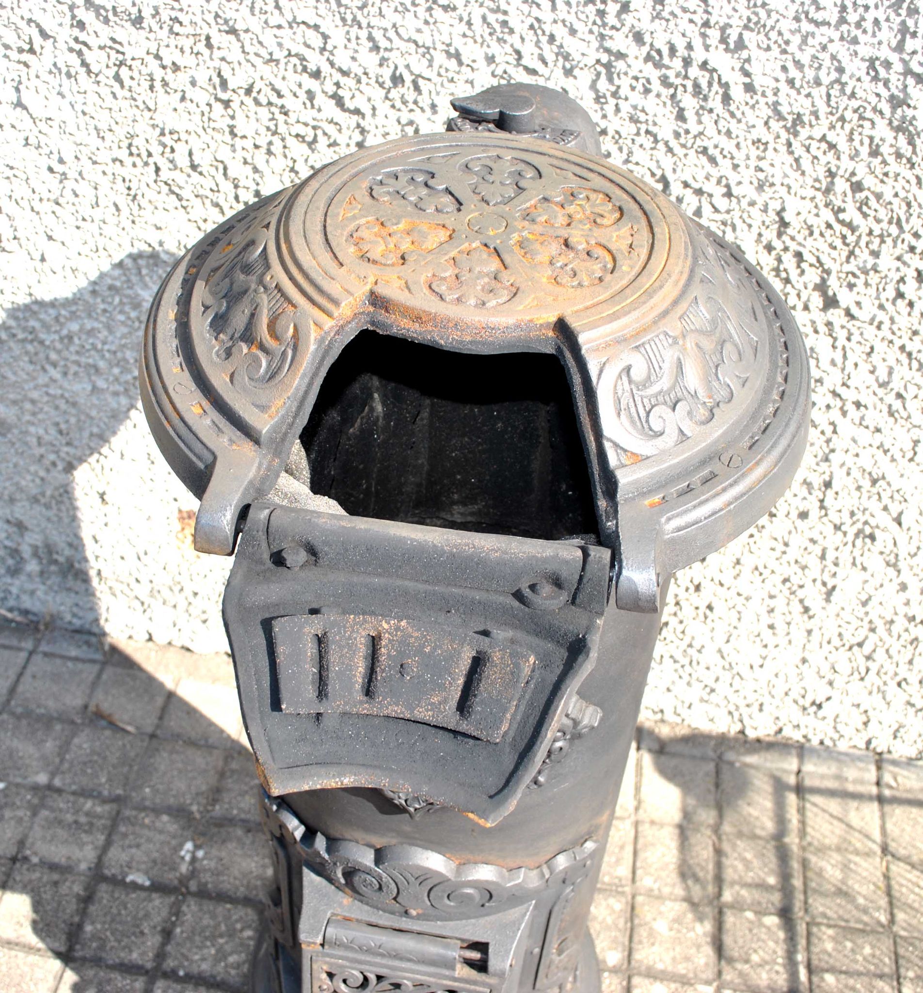 Antique decorative stove in black cast iron Germare charcoal