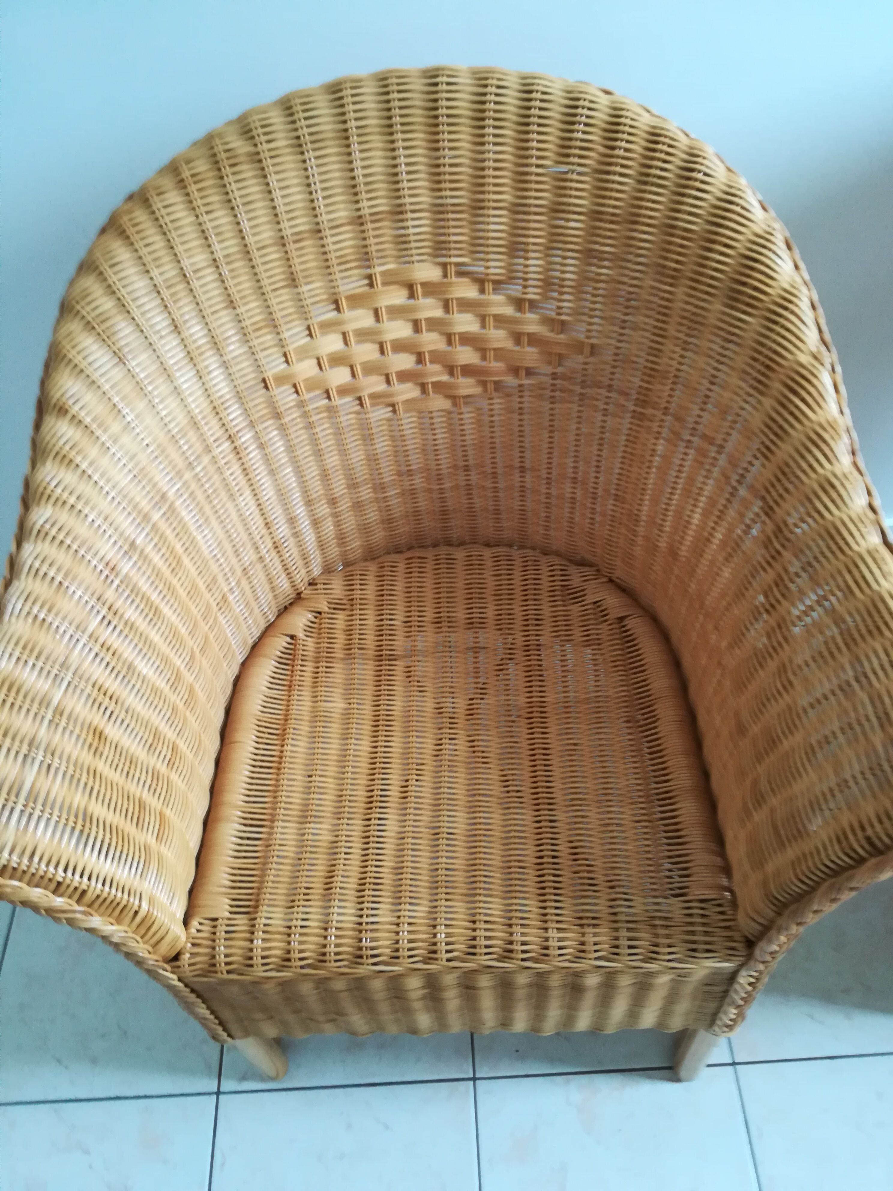 Pair of two light rattan chairs