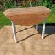 Antique patinated round table – wooden top