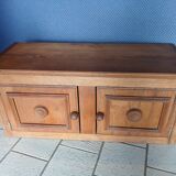 Low oak furniture in the Dudouyt style, with a sculpted front.