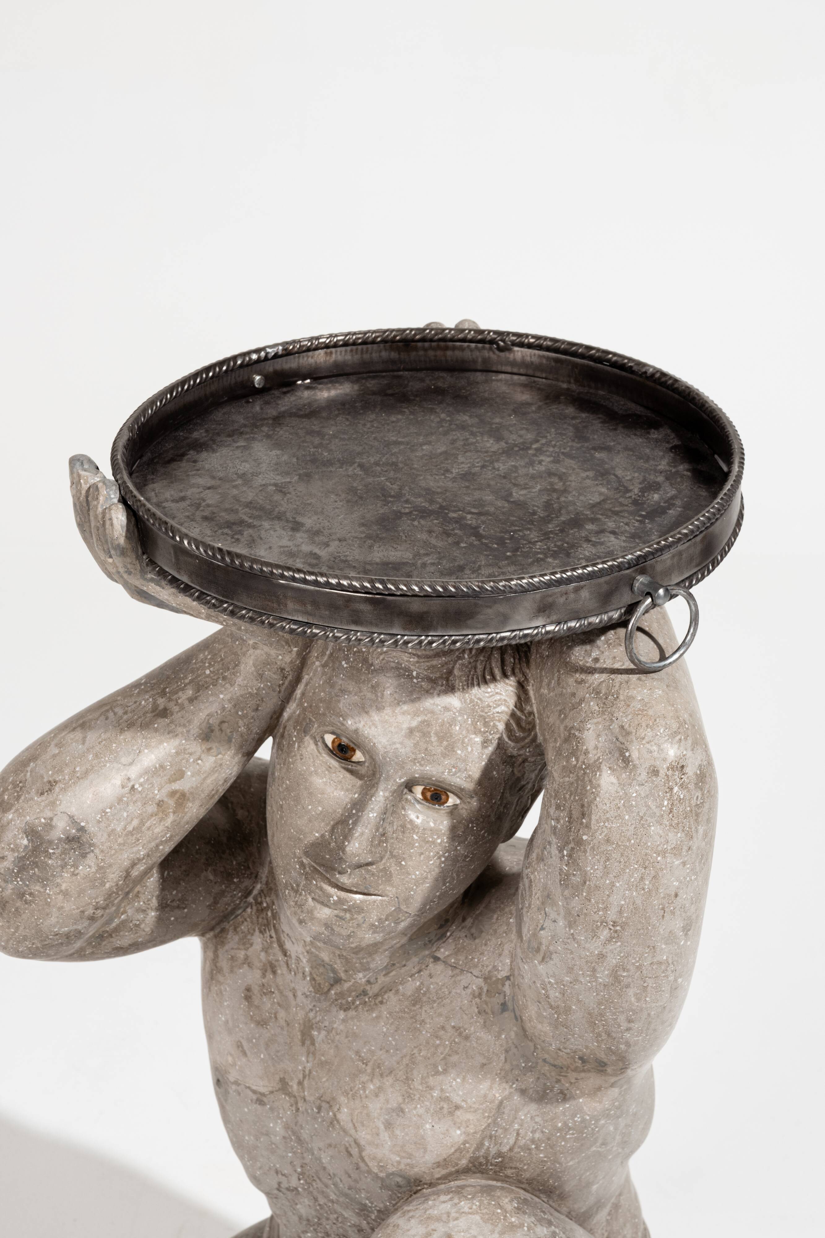 "Kneeling Strength" Pedestal Table