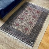 Antique Persian rug, signed.